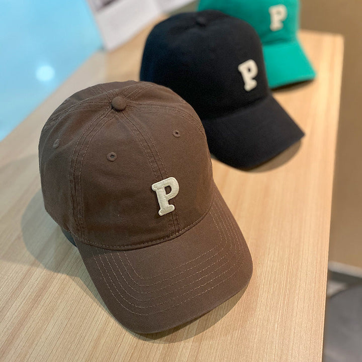 solid color retro lowercase P-shaped baseball cap