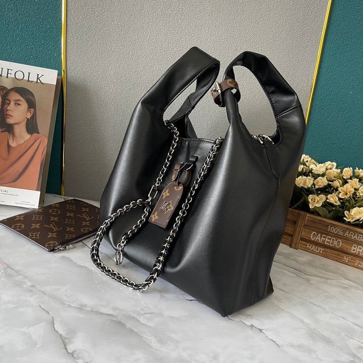 Glossy cowhide handbag