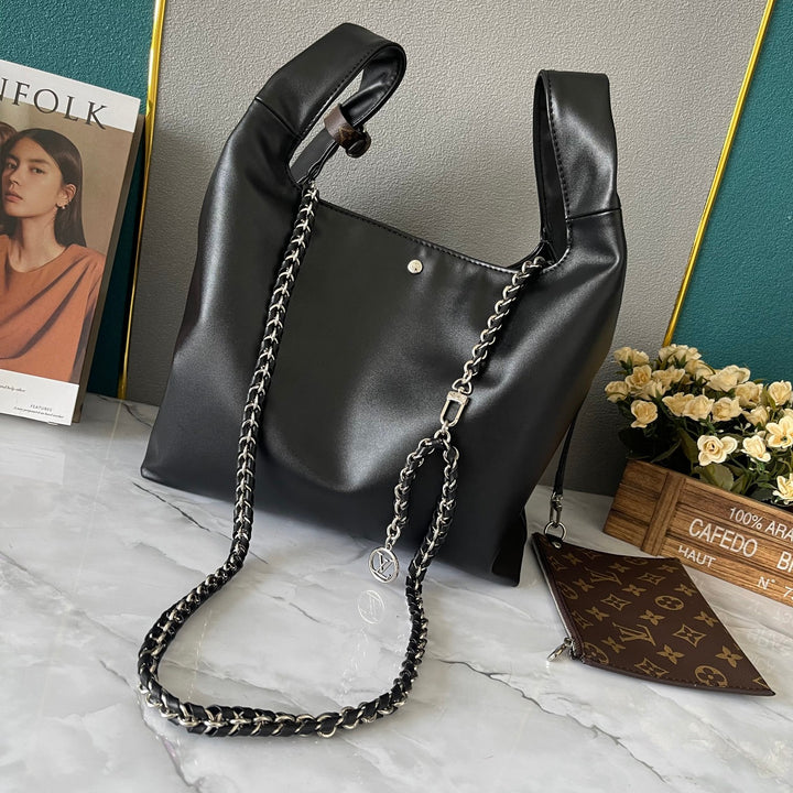 Glossy cowhide handbag