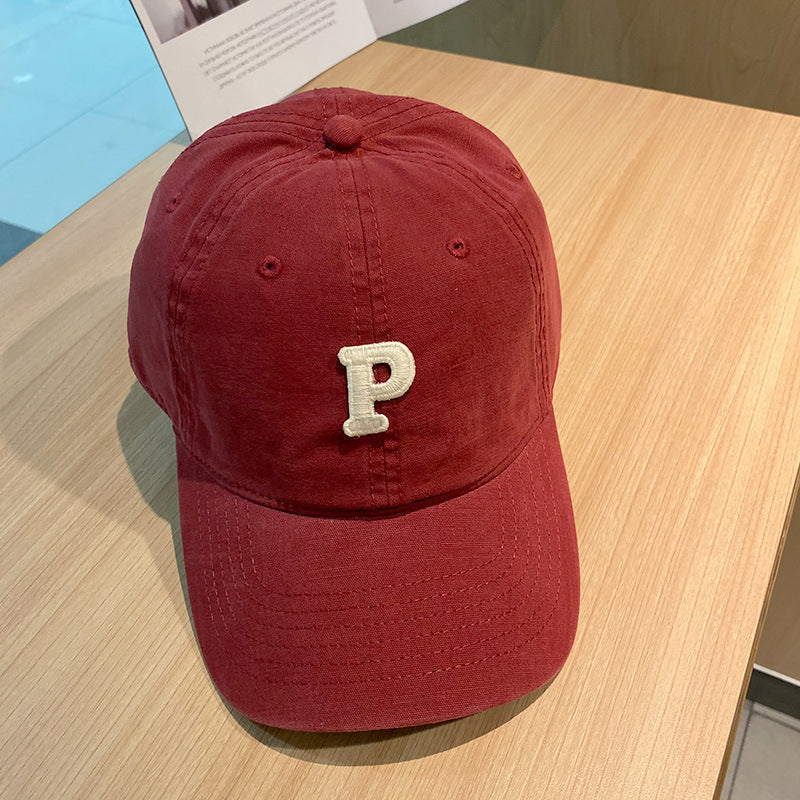 solid color retro lowercase P-shaped baseball cap