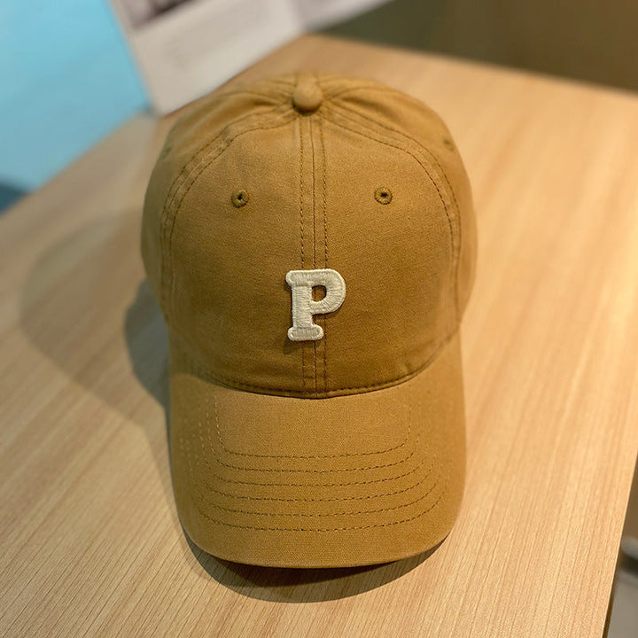 solid color retro lowercase P-shaped baseball cap