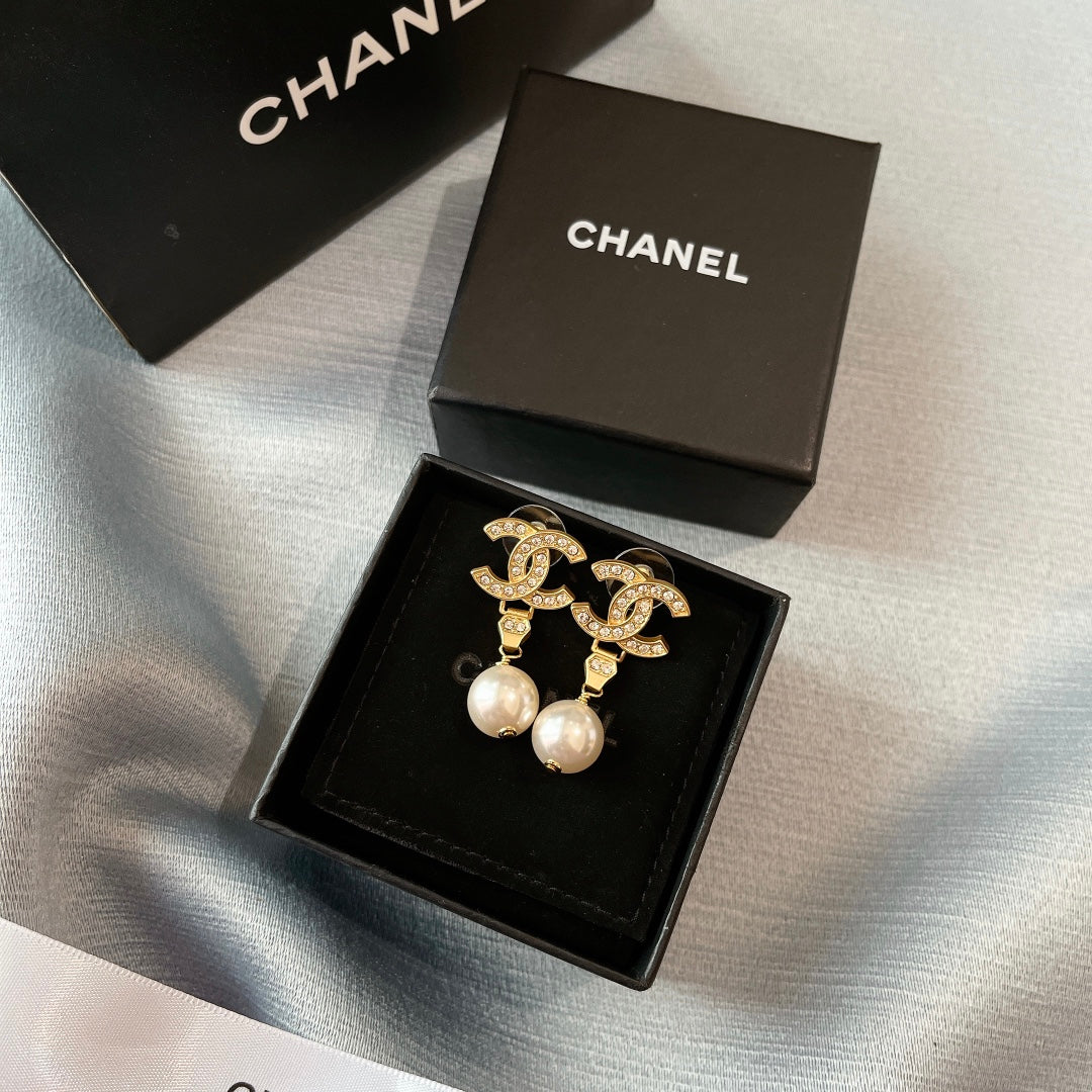 New double C gold coloured dangling pearl earrings