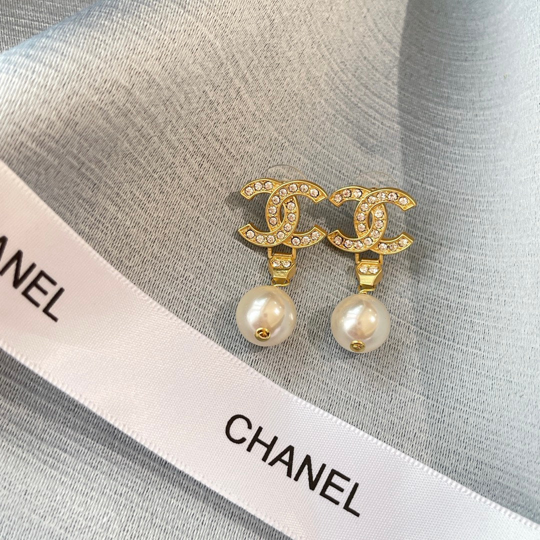 New double C gold coloured dangling pearl earrings