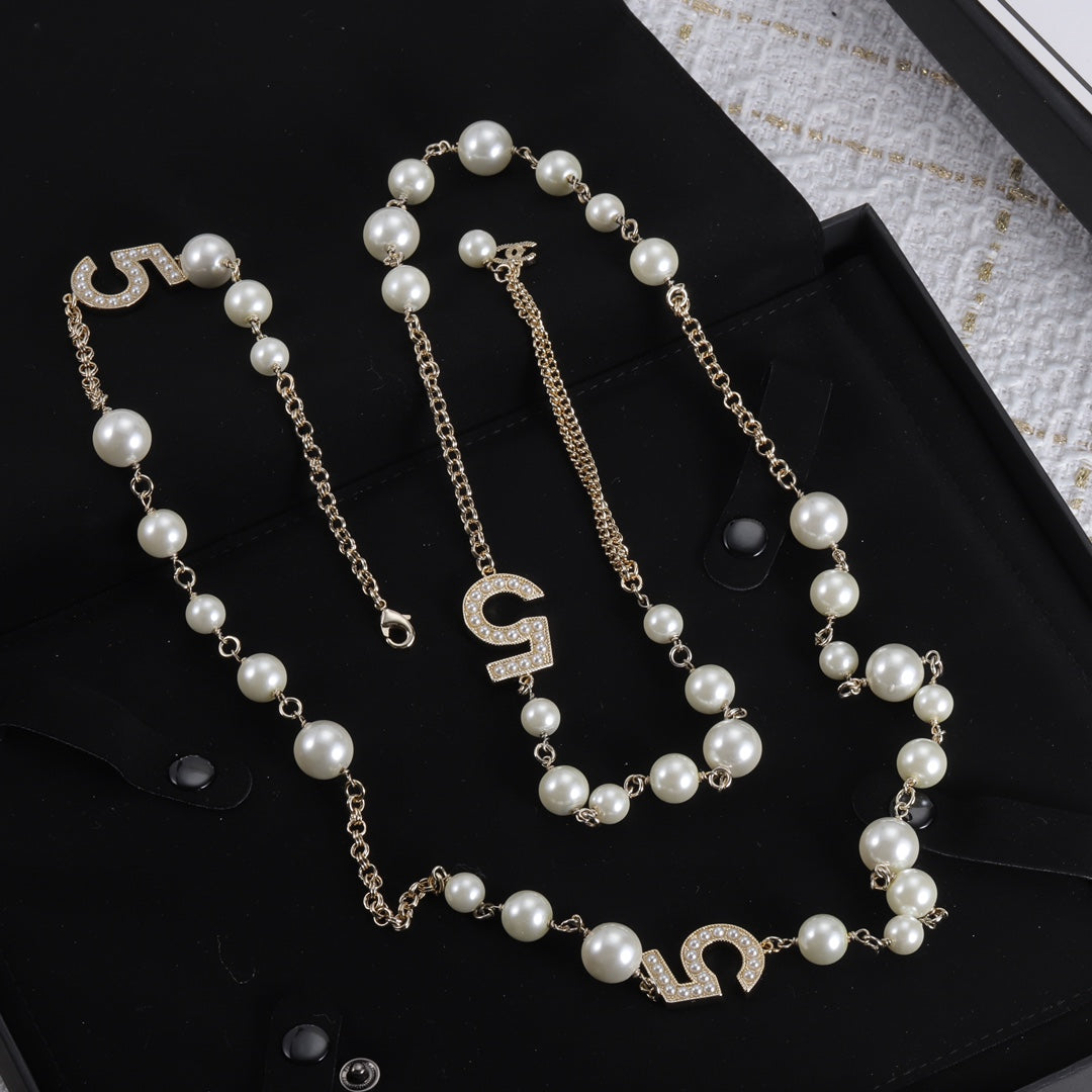 Luxurious Numbers and Pearls Brass Necklace