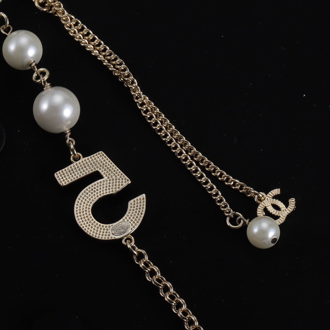 Luxurious Numbers and Pearls Brass Necklace