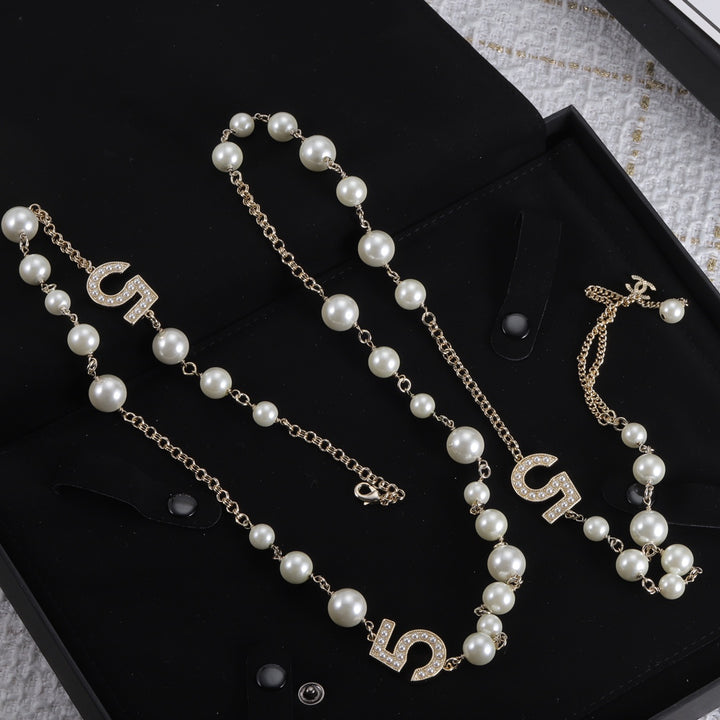 Luxurious Numbers and Pearls Brass Necklace