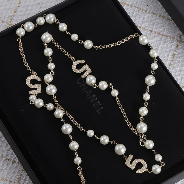 Luxurious Numbers and Pearls Brass Necklace