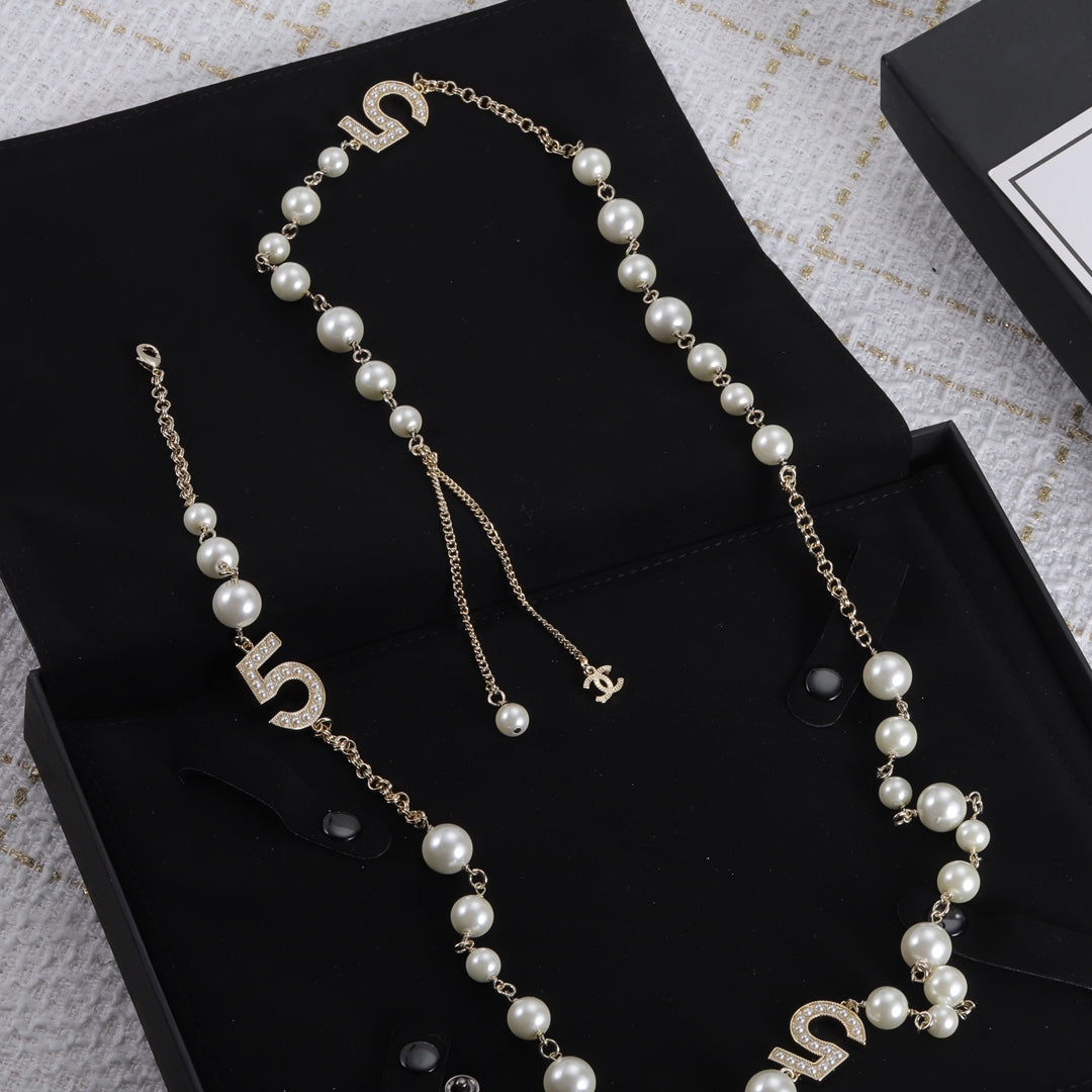 Luxurious Numbers and Pearls Brass Necklace