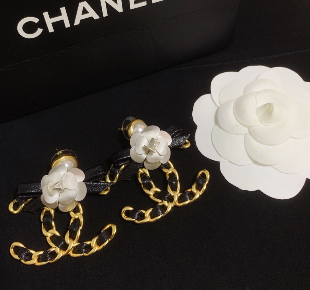 fashion camellia leather earrings