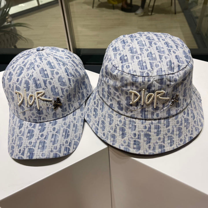 Two styles of CD graffiti hats