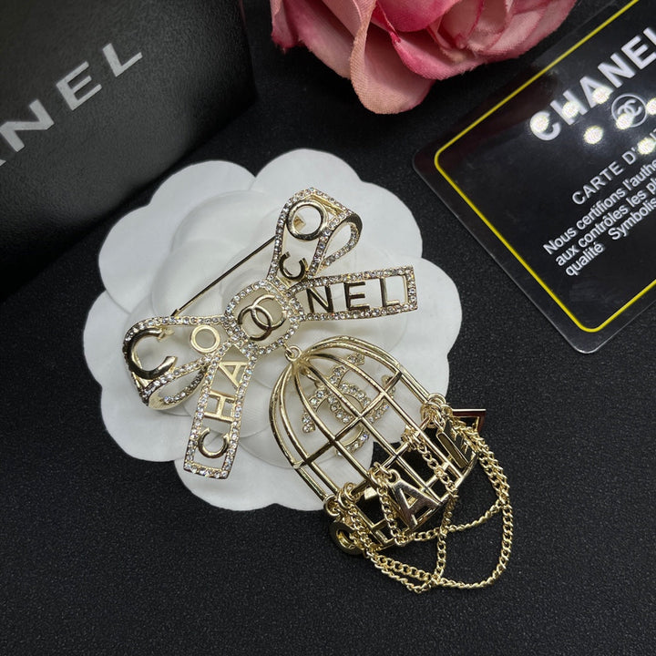 Luxury CC Bow Tassel Brooch