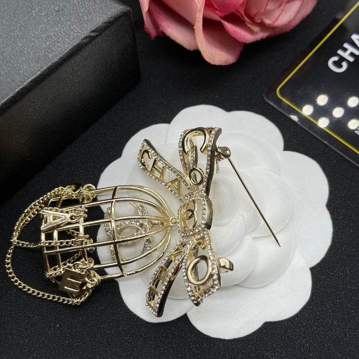 Luxury CC Bow Tassel Brooch