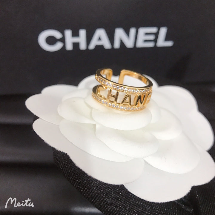 2-color monogram ring with diamonds