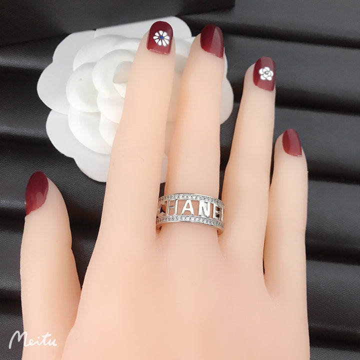 2-color monogram ring with diamonds