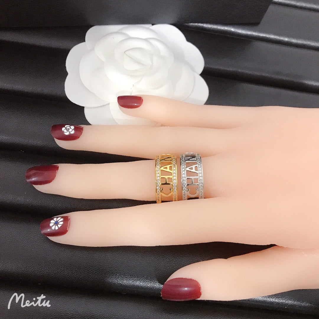 2-color monogram ring with diamonds