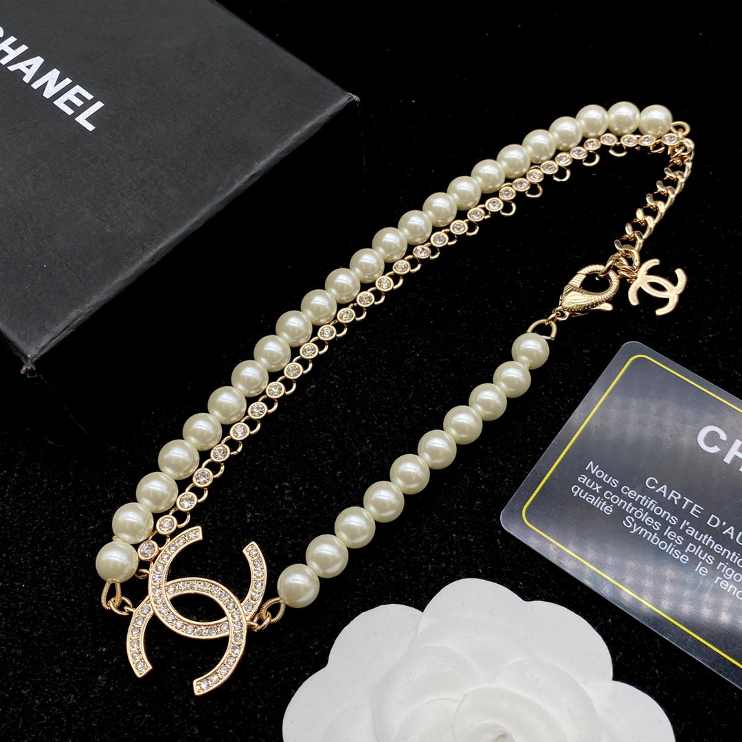 Luxury pearl and diamond necklace + bracelet