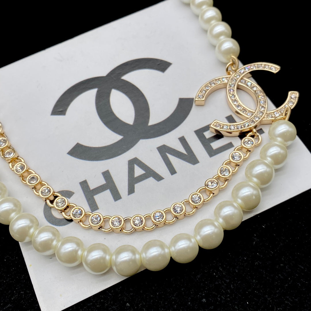 Luxury pearl and diamond necklace + bracelet