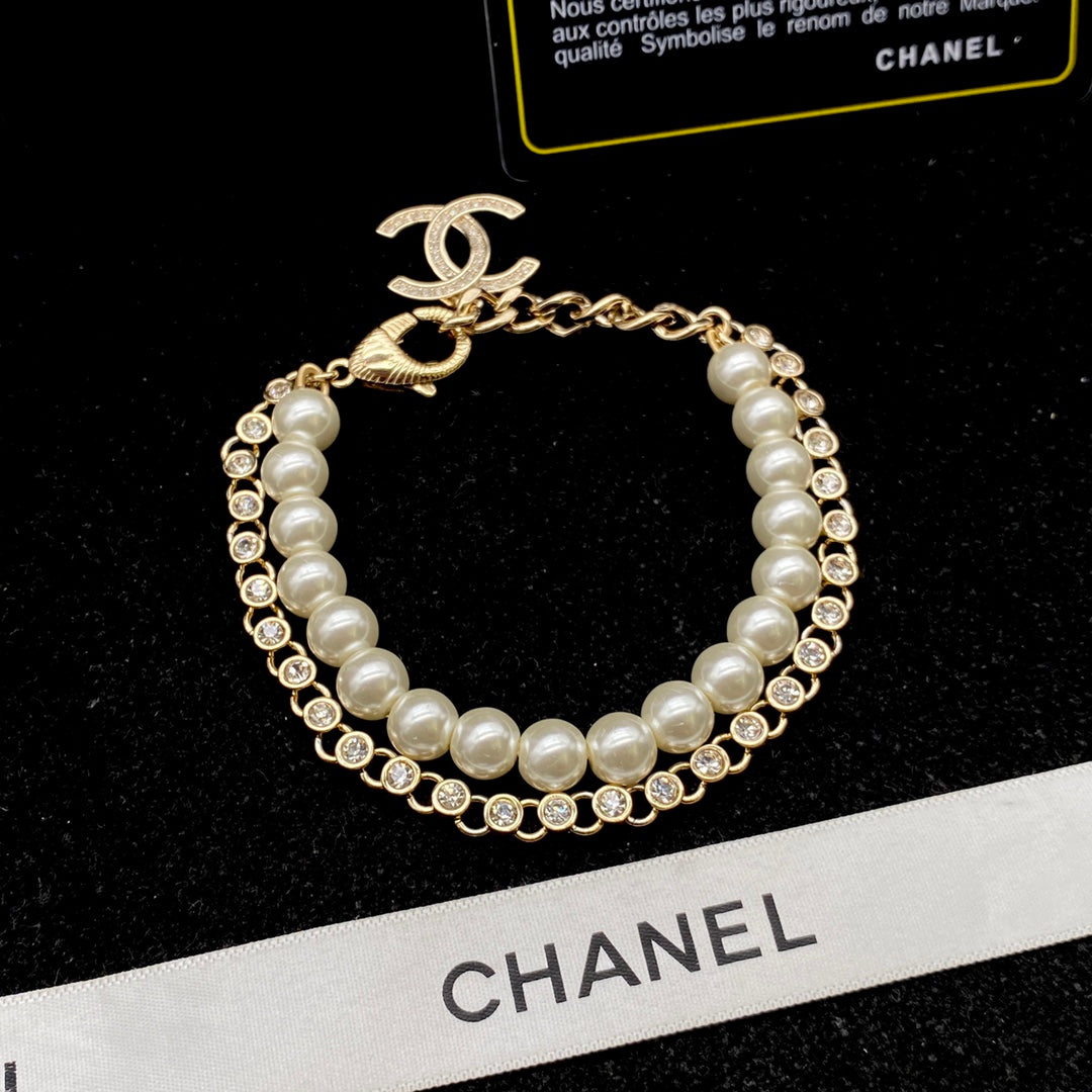 Luxury pearl and diamond necklace + bracelet