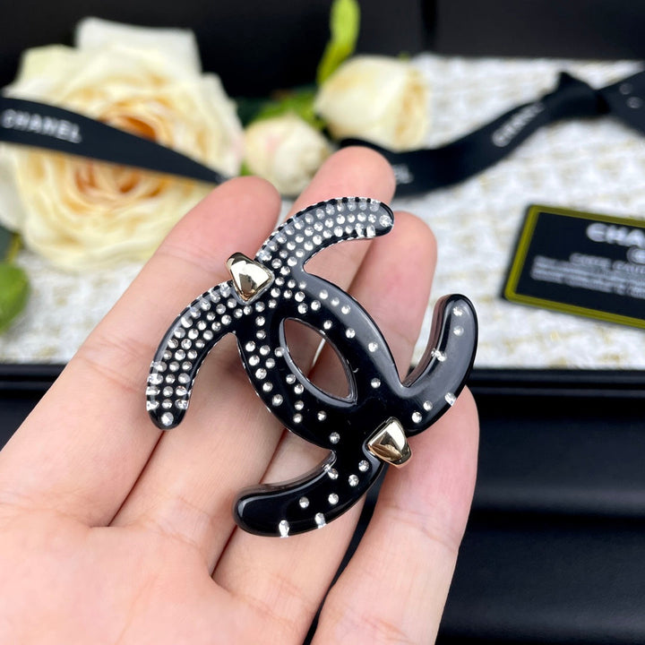 High-end black night star brooch