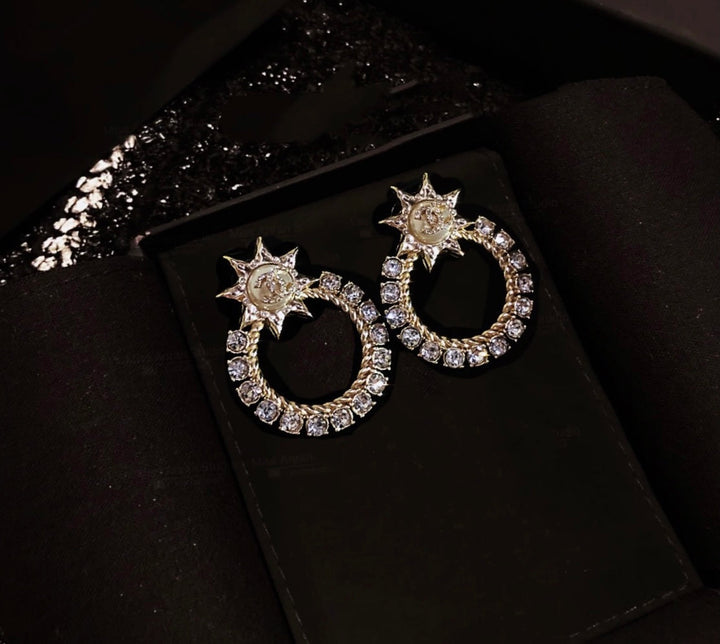 New Sun Hollowed Out Diamond Earrings