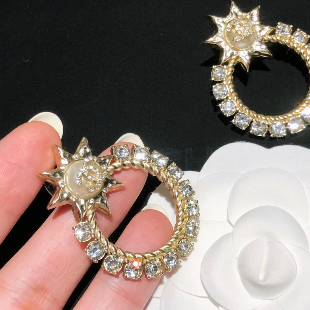 New Sun Hollowed Out Diamond Earrings