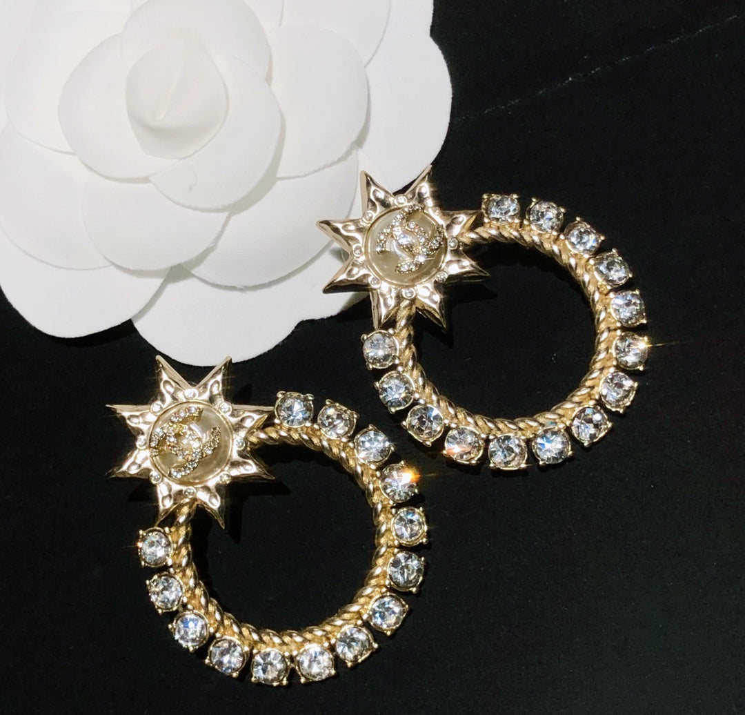 New Sun Hollowed Out Diamond Earrings