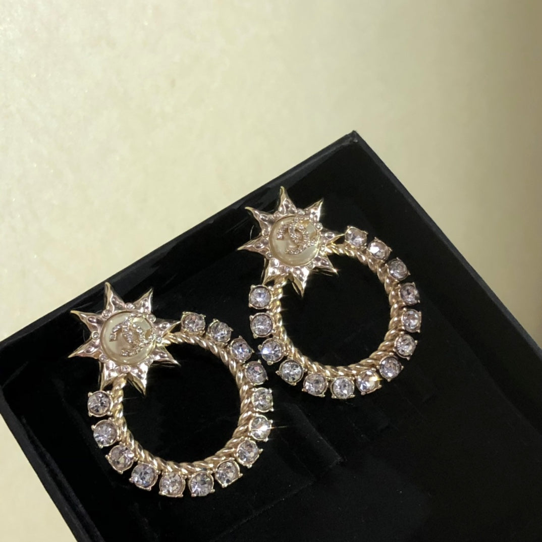 New Sun Hollowed Out Diamond Earrings