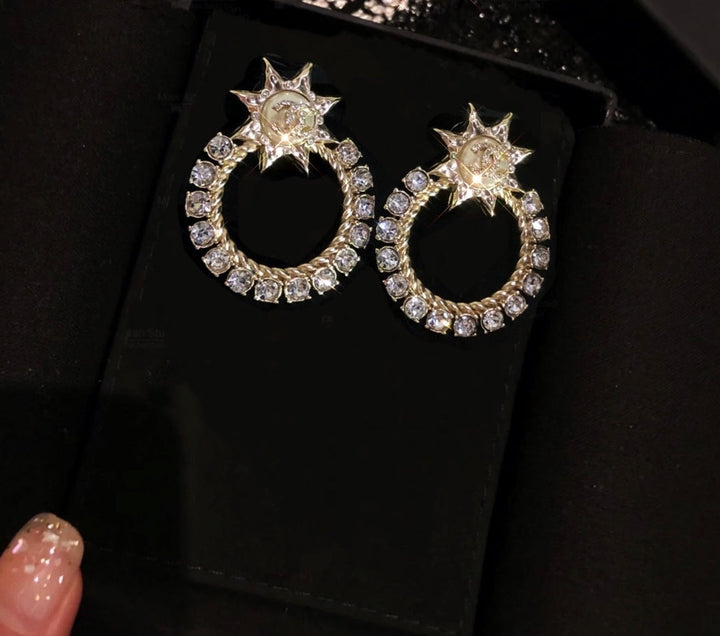 New Sun Hollowed Out Diamond Earrings