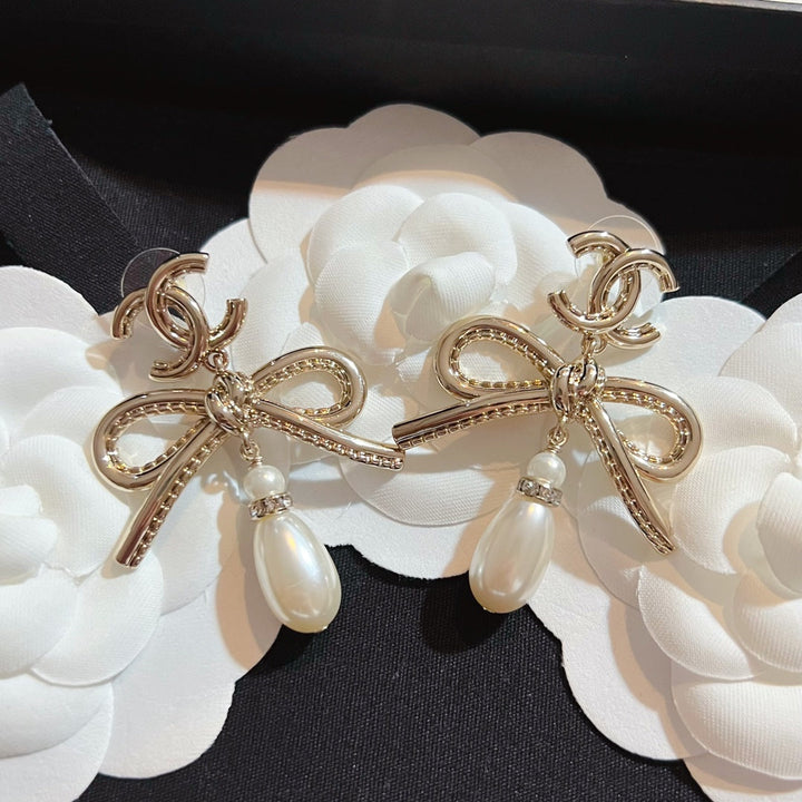 luxury CC bow pearl earrings