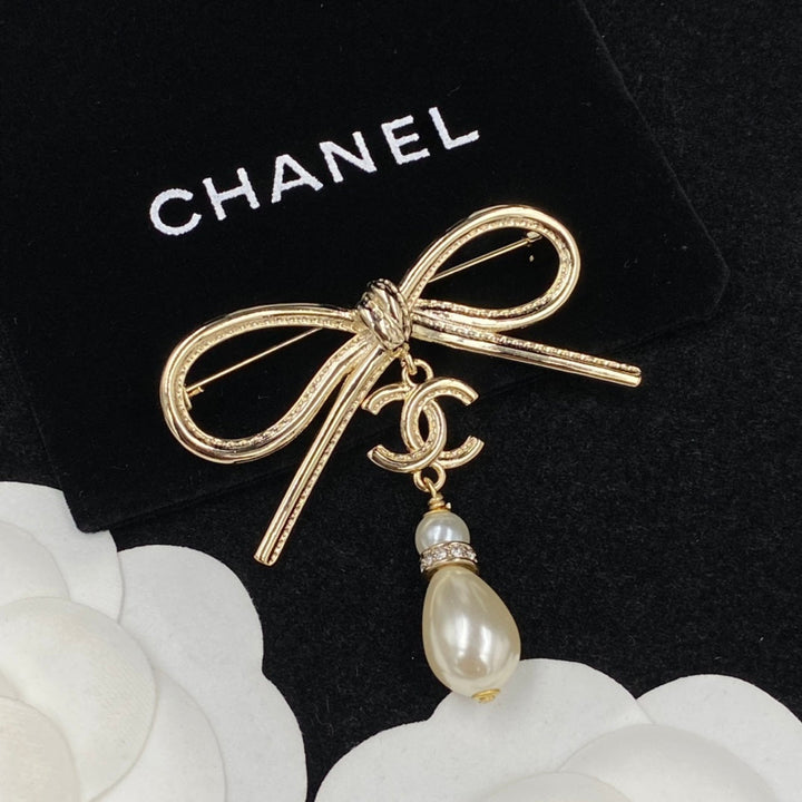 Fashion bow pearl brooch