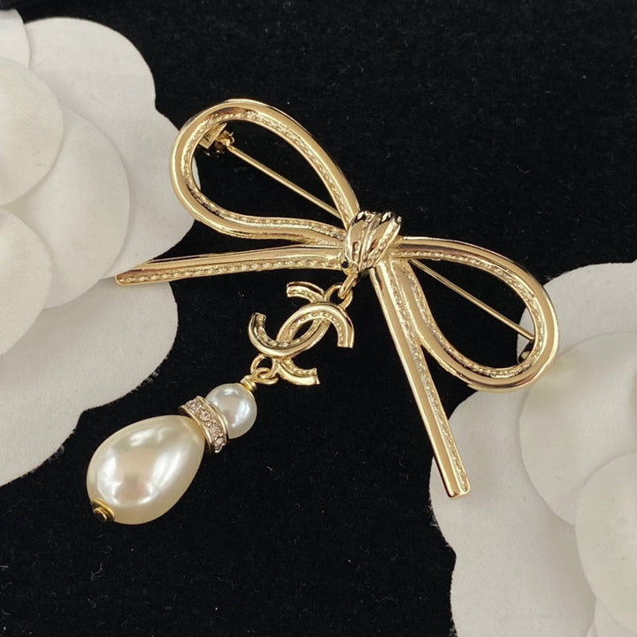 Fashion bow pearl brooch