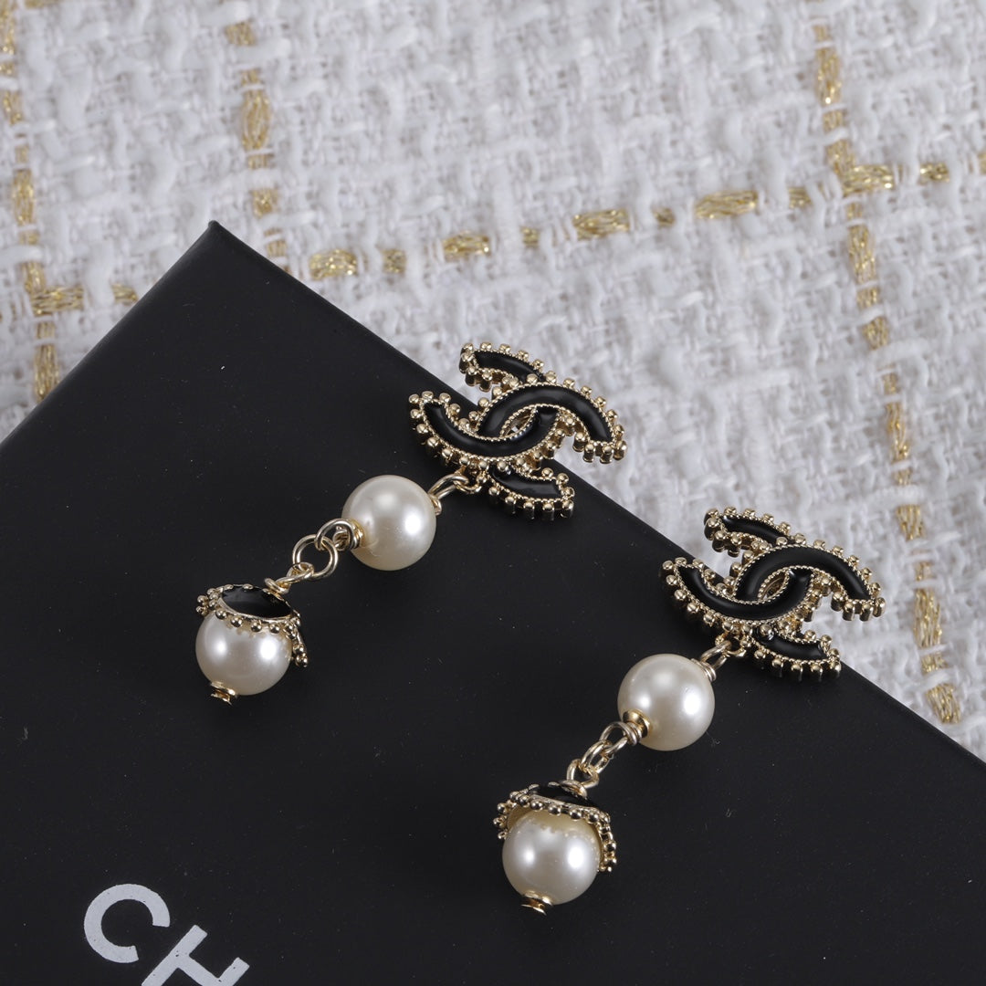 new CC pearl pendant earrings