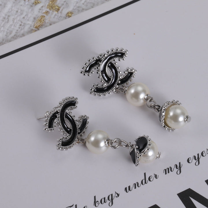 new CC pearl pendant earrings