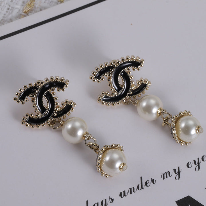 new CC pearl pendant earrings