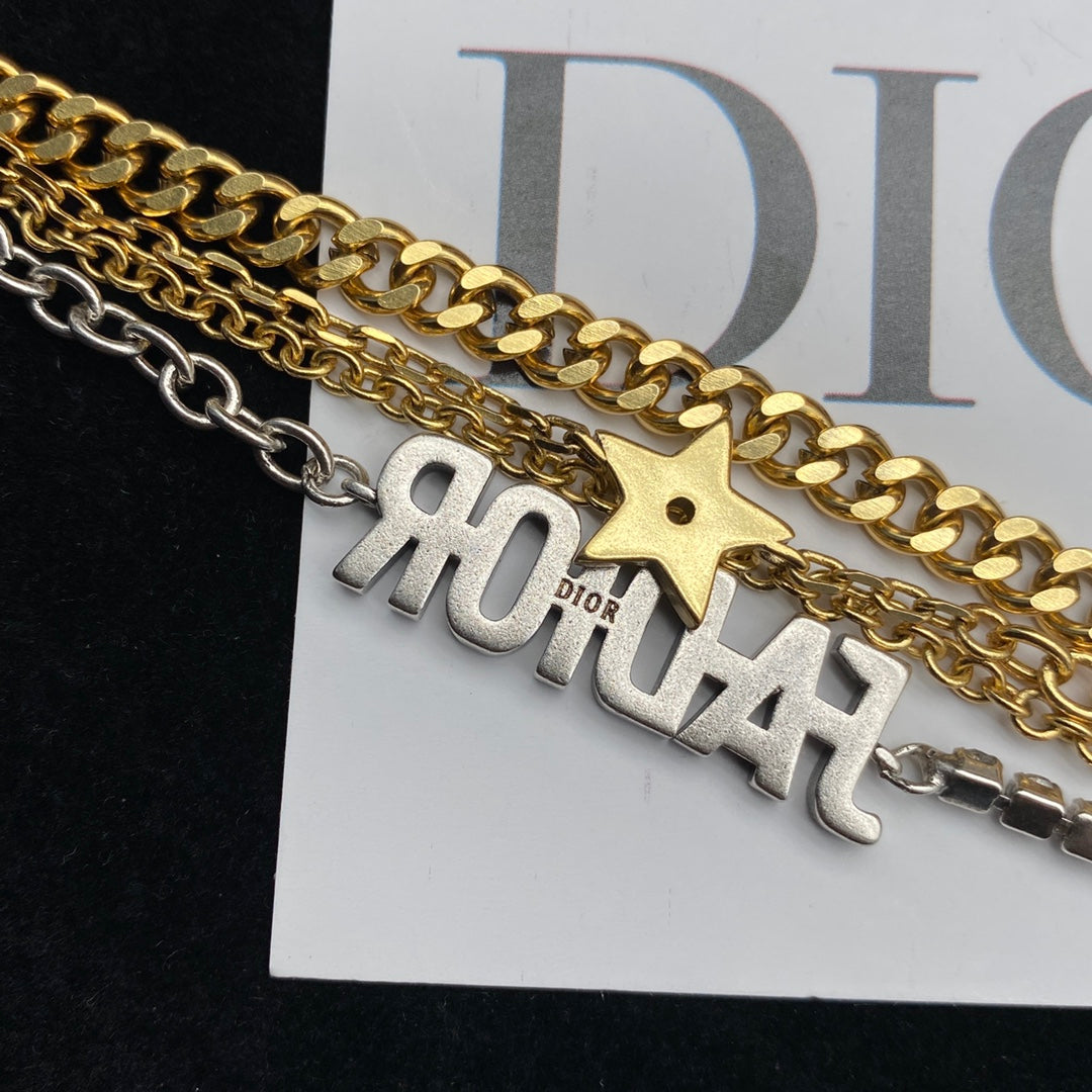 Deluxe two-tone monogrammed sweater chain plus bracelet